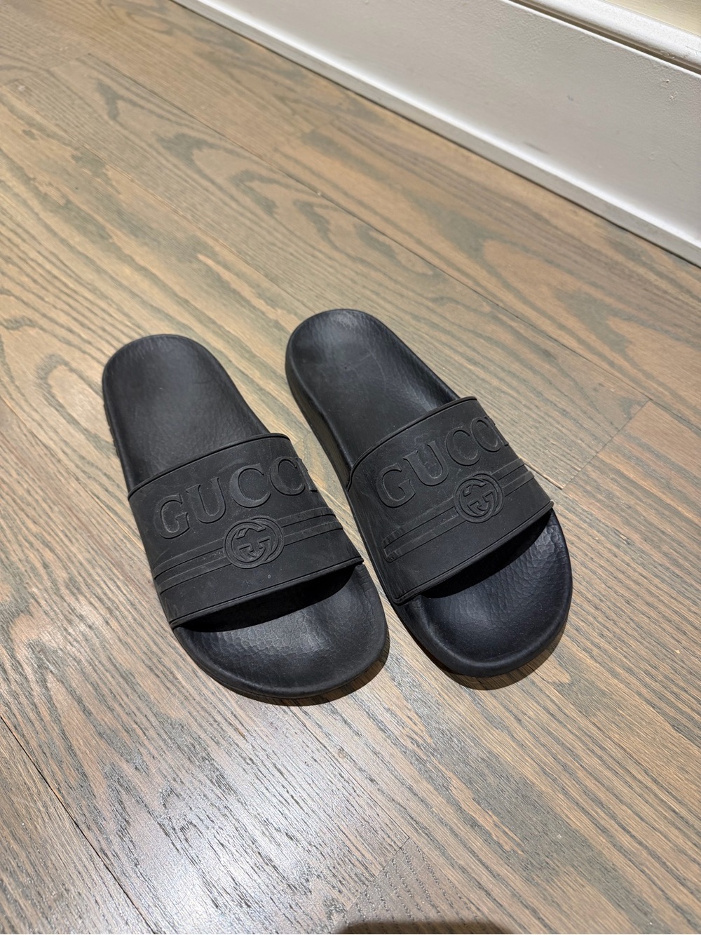 Gucci Black Embossed Logo Rubber Slide Sandals